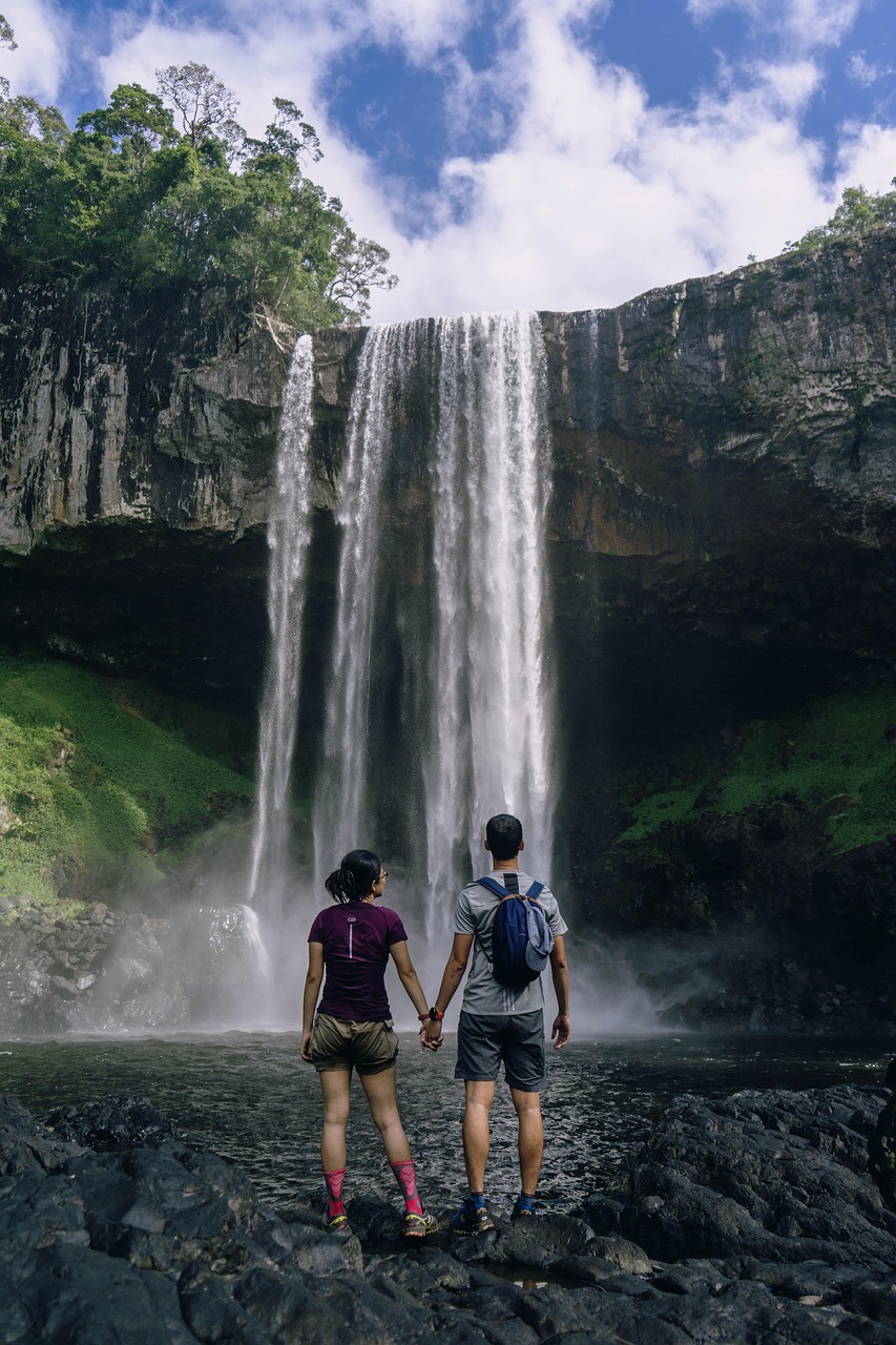 travel, wanderlust, couple, phone wallpaper, waterfalls, falls, holding hands, backpackers, backpacking, travelers, traveling, adventure, landscape, banff, trekking, trip, nature, vacation, journey, alberta, aesthetic wallpaper, iphone wallpaper